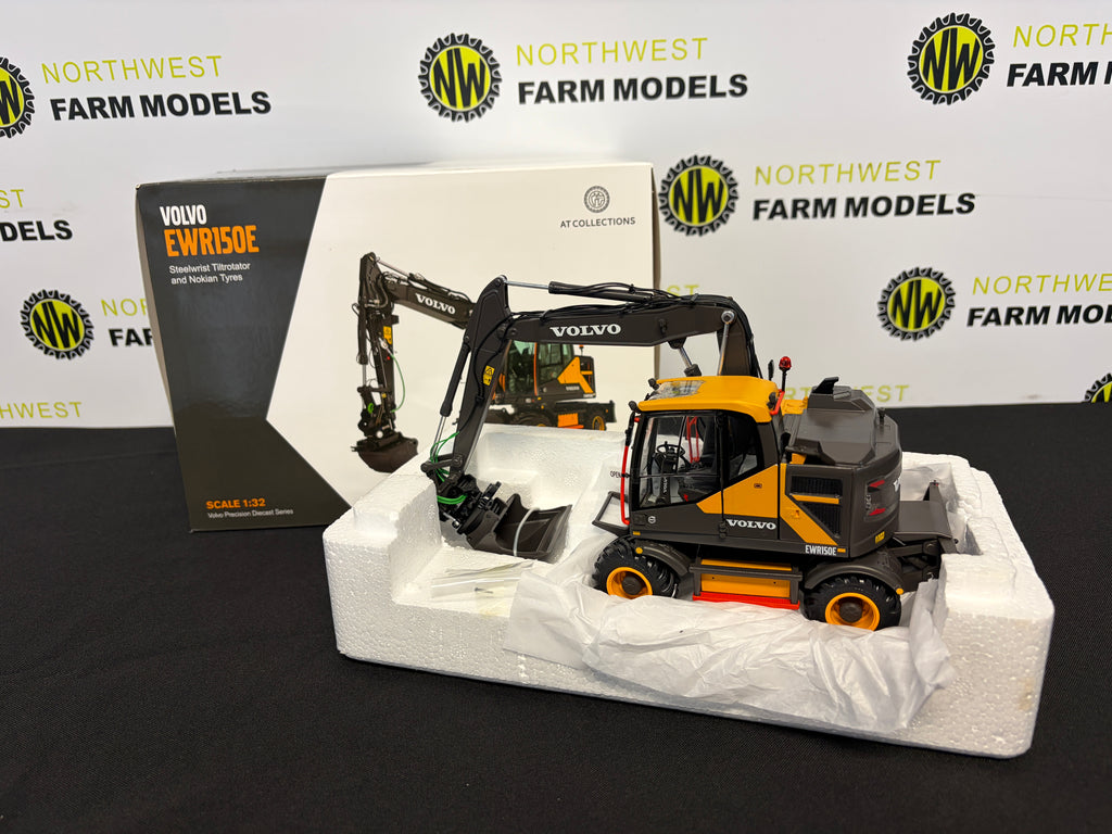 AT COLLECTIONS AT3200100 1:32 SCALE VOLVO EWR150E STEELWRIST TILTROTATOR AND NOKIAN TYRES