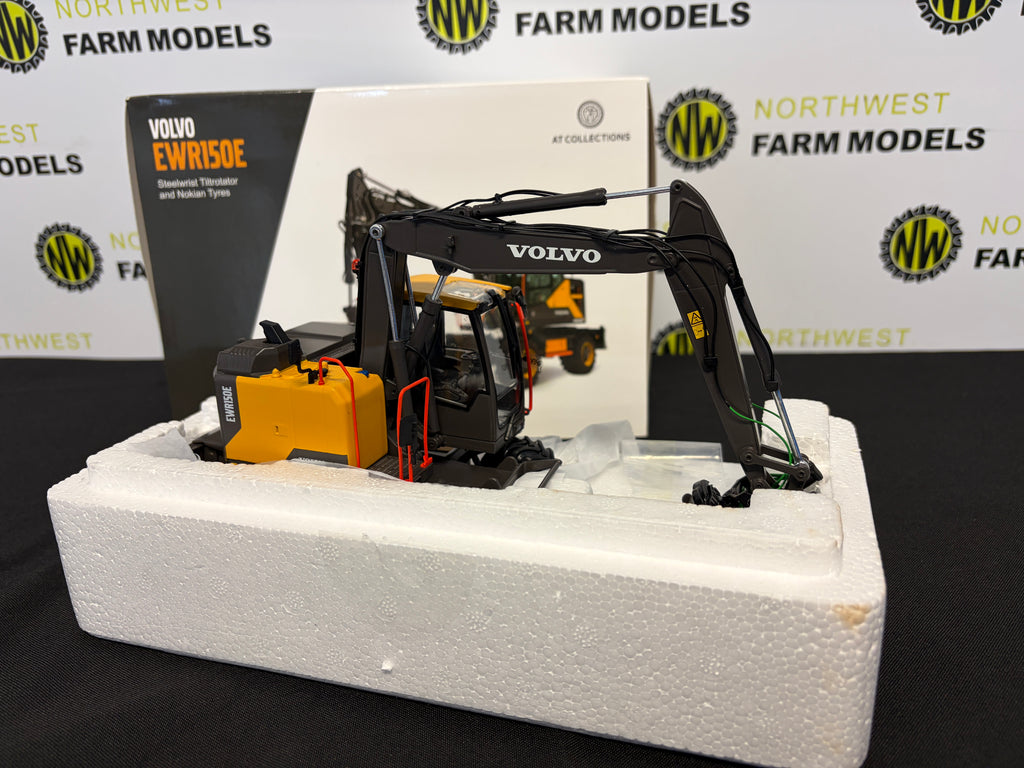 AT COLLECTIONS AT3200100 1:32 SCALE VOLVO EWR150E STEELWRIST TILTROTATOR AND NOKIAN TYRES