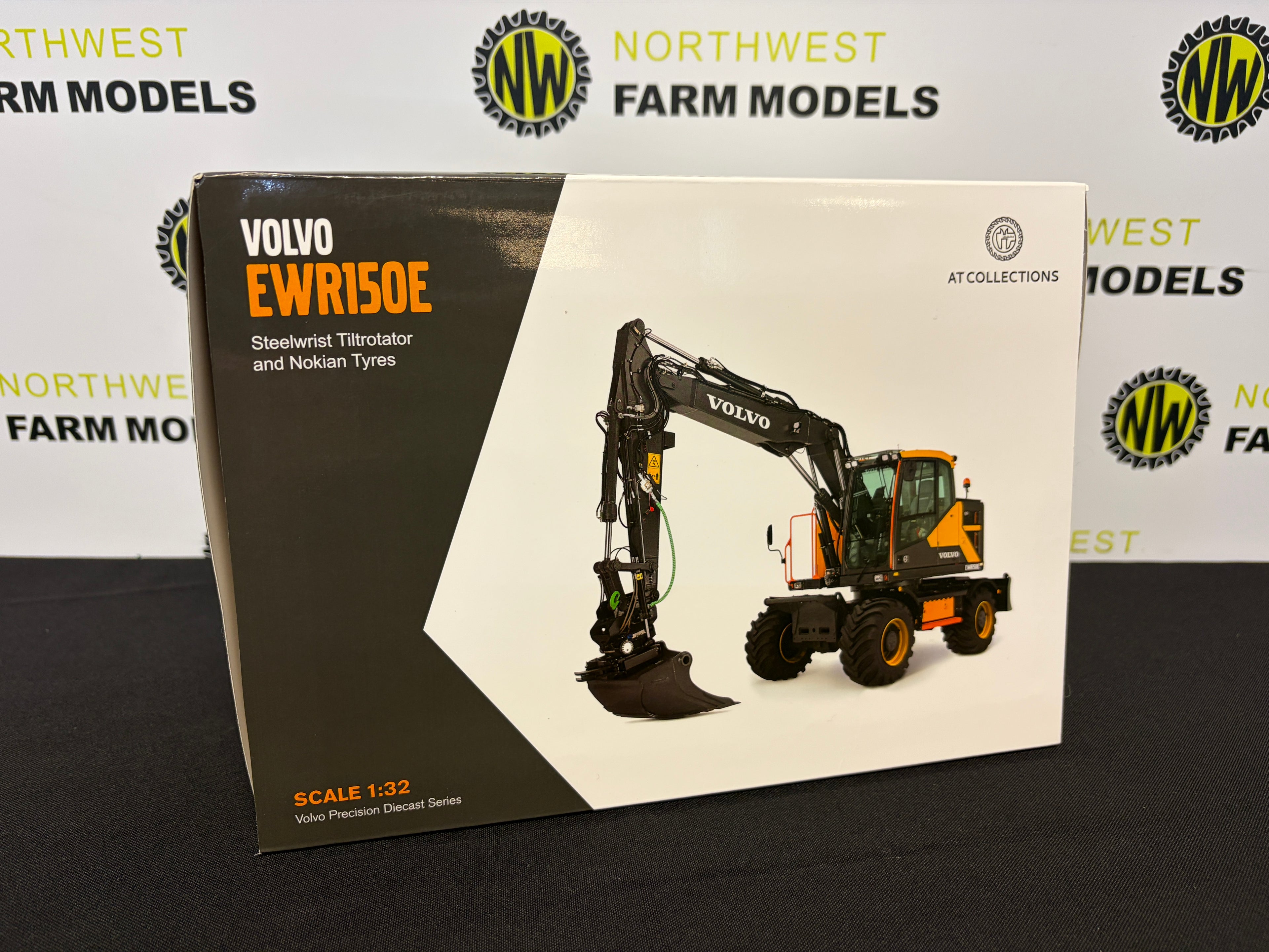 AT COLLECTIONS AT3200100 1:32 SCALE VOLVO EWR150E STEELWRIST TILTROTATOR AND NOKIAN TYRES